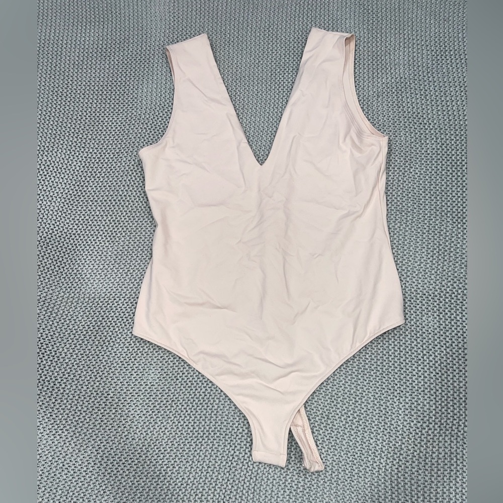 LIKE NEW Free People Body Suit Light Pink